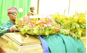 Deputy Vice-Chancellor (Development), Prof. Clement Adeofun, who stood in for the Vice-Chancellor placing a wreath, as a sign of last respect for the late Prof. Siaka Momoh.