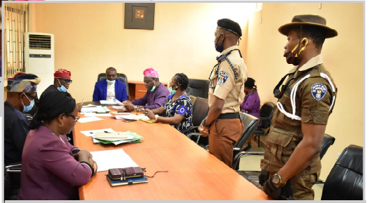 Odeda Area Commander of Man ‘O’ War, Comrade Charles Geteloma (Standing, 2nd
Right) addressing the Vice-Chancellor, Prof. Kolawole Salako (Centre) and other Principal
Officers of the University.